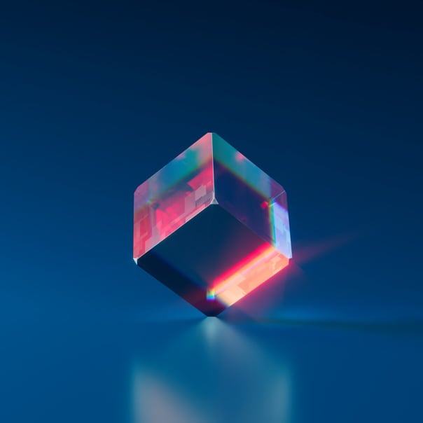 NFT picture containg cube made from glass on blue backfround, glowing in red and blue